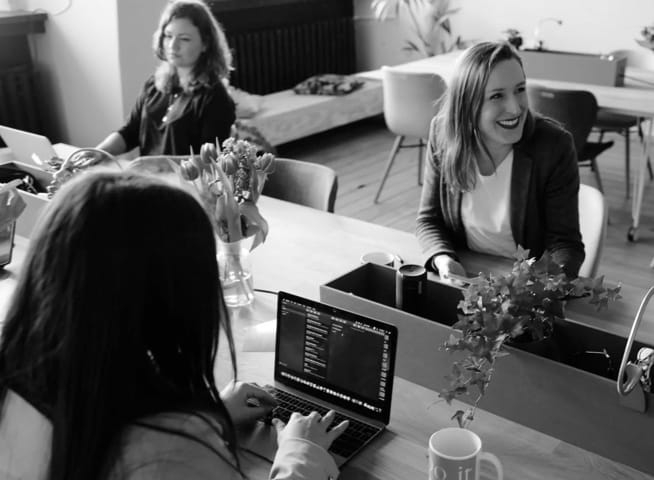 A picture of people working in a office